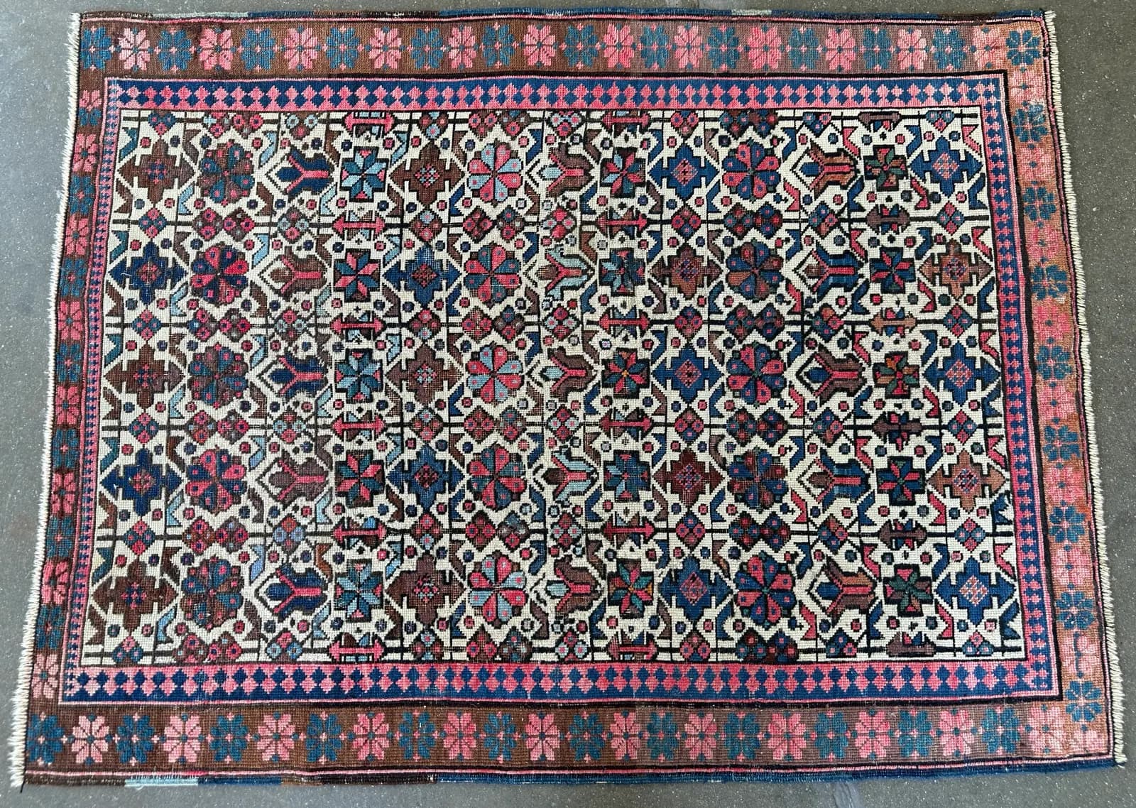 Wool antique Persian rug with rewoven pile after moth treatment and repair — Ahmadi Rug, North Shore Chicago